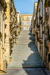 Staircase decorated with ceramics, Caltagirone, Italy. Vertical view of the famous Scala Santa Maria del Monte, a long public staircase in the hilltop medieval town of Caltagirone, famous for decorate