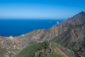 Panoramic view on green mountains and blue Atlantic ocean, Anaga national park near Tanagana village,  North of Tenerife, Canary islands, Spain