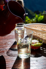 Dinner at guachinche, typical Canary Island establishment on Tenerife, where locally produced white or red wine served accompanied by homemade traditional food.