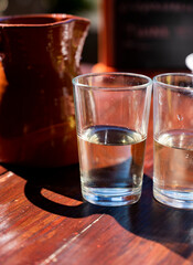 Dinner at guachinche, typical Canary Island establishment on Tenerife, where locally produced white or red wine served accompanied by homemade traditional food.