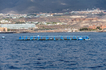 View on fisherman nets in Atlantic ocean near South coast of Tenerife island during sail boat trip...