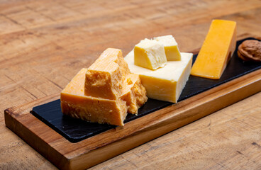 British cheeses collection, Scottish coloured and English matured cheddar cheeses