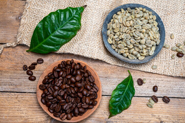 Green un-roasted and brown roasted coffee beans from Africa coffee producing region, cultivating in Ethiopia, Ivory Coast, Uganda, Kenya, Rwanda and Tanzania