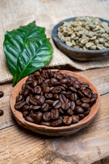 Green un-roasted and brown roasted coffee beans from Africa coffee producing region, cultivating in Ethiopia, Ivory Coast, Uganda, Kenya, Rwanda and Tanzania