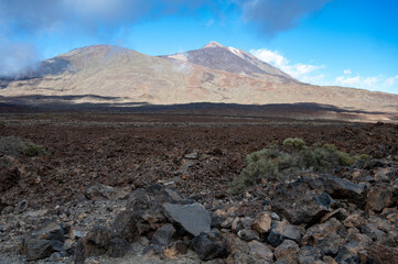 Visiting Teide national park on Tenerife and view on volcanic landscapes, Canary islands, Spain