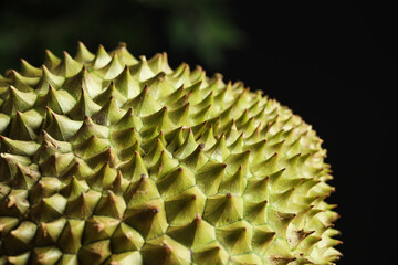 Naklejka na ściany i meble Closeup view of ripe durian on blurred background