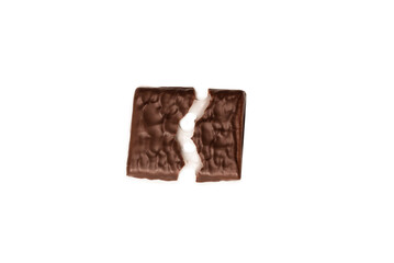 Dark chocolate candies isolated on white background.