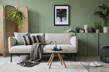 Elegant living room interior design with mockup poster frame, modern grey sofa, wooden commode,...