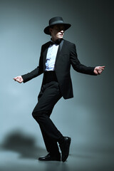 Obraz na płótnie Canvas dancer in elegant tuxedo