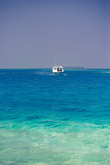 Toutists boat  in the sea at Aari Athol, Maldives