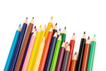 Many multicolored pencils, isolated on white background with copy space. Art and education background.