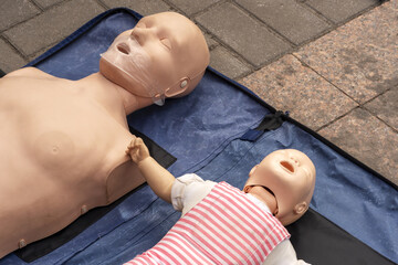 CPR on training doll. resuscitation mannequin.Resuscitation Technique On Dummy .