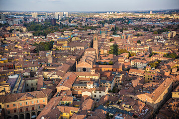 Fototapeta premium Aerial view of Bologna old town, tile roofs of bologna. Bologna view from the tower, Italy