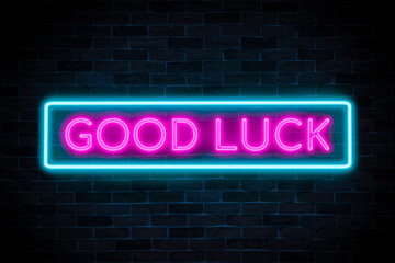 Good Luck neon banner on a brick wall background.