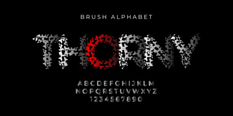 thorny text effect and alphabet font vector
