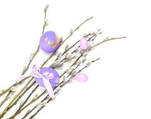 Easter eggs and pussy willow branches isolated on white