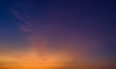 Colorful sunset sky clouds in the evening on twilight, dusk sky background 