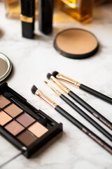 Set of luxurious black makeup brushes close-up
