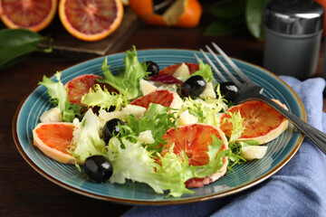 Plate of delicious sicilian orange salad on table, closeup