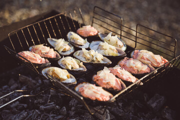 grilled seafood. barbecue, mussels with cheese