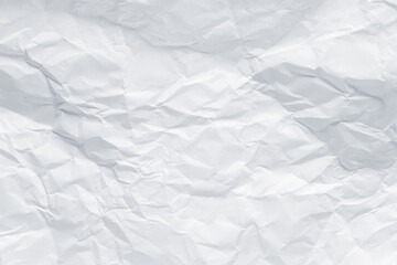 White crumpled paper texture background.