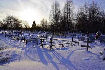 Village cemetery covered with snow