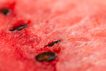 Delicious juicy watermelon with pits and texture, macro. Summer time concept