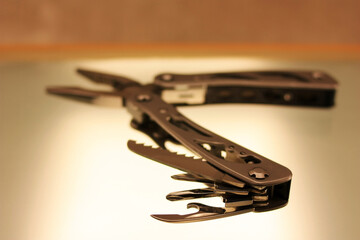 Multitool with open blades and accessories