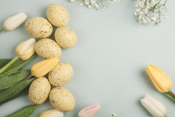 Hand painted pastel colored Easter eggs background. Happy Easter greeting card or invitation.