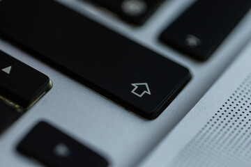 Shift button on the laptop keyboard, close-up