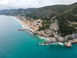 Naklejka na ściany i meble Aerial view of Varigotti in Liguria, Italy, small town on the ligurian coast. Drone photography of Varigotti, one of coolest ligurian village in north Italy, near Noli and Finale Ligure.