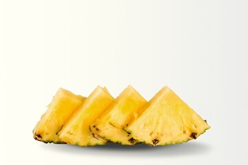 Pineapple fresh yellow slices. Cut pineapple on the desk