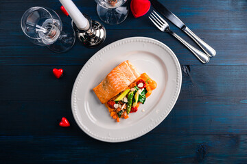 Steam salmon and vegetables, Paleo, keto, fodmap diet on old rustic wooden table