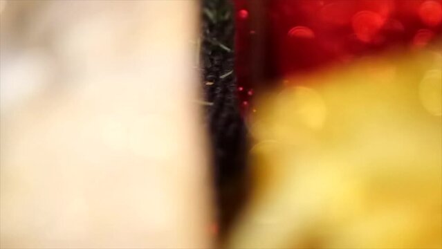Christmas gift holiday decoration concept. Glitter sparkly presents tied with a bow red, gold, white, silver, shallow depth of field