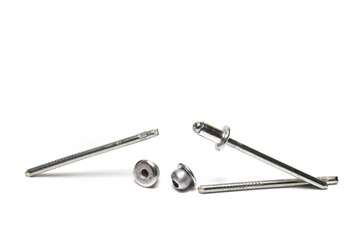 Closeup silver metal blind rivets white background