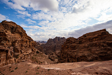 Sunset in Wadi Rum desert. Orange sunset sky and clouds in Wadi Rum, Jordan
