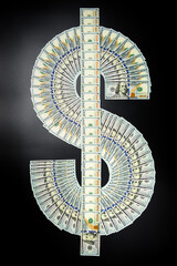 US dollar sign made of one hundred dollar banknotes. Cash money banknotes. US dollars in dollar...