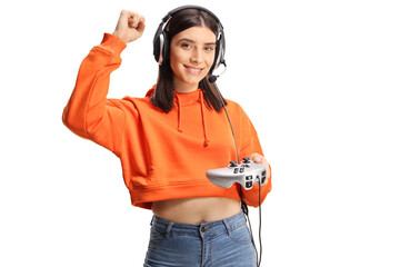 Happy young female with headphones and joystick gesturing with hand © Ljupco Smokovski