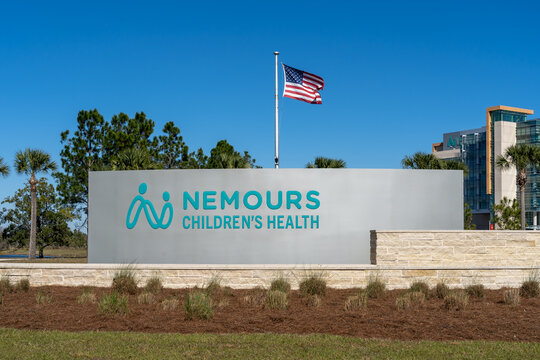 Orlando, Florida, USA -  January  29, 2022: Nemours Children's Health ground sign in Orlando, Florida, USA. Nemours Children's health is pediatric research and clinical trials.