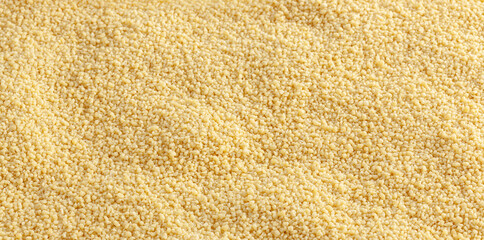 Close up of uncooked cous cous backgound