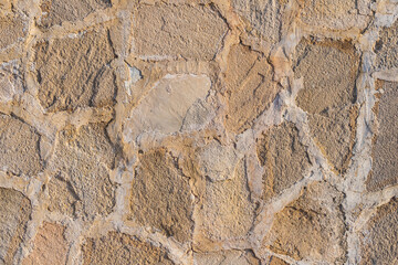 Background of brown-gray stone wall  . Pattern of slate wall texture and background