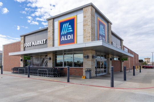 Pearland, Texas, USA - February 19, 2022: An Aldi store in Pearland, Texas, USA. Aldi is the common brand of two German family-owned discount supermarket chains. 