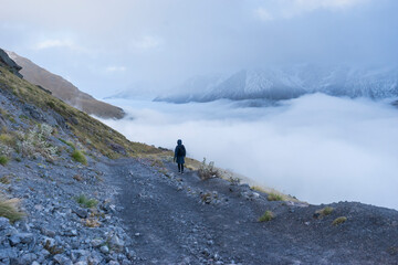 Fototapeta na wymiar Fog and clouds on mountain. High mountain in mist and cloud