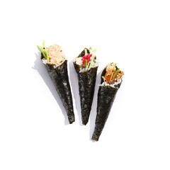 Set of Japanese temaki sushi  with shrimp, salmon and eel on white background. Hand rolls with fish...