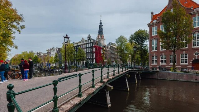 Day Time Lapse with clouds and boats in Amsterdam, The Netherlands