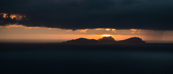 Spectacular sunny and cloudy sunset seen from Valentia Island Ring of Kerry Ireland
