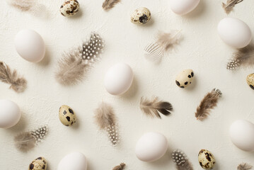 Top view photo of easter decorations partridge feathers and easter eggs on isolated white background