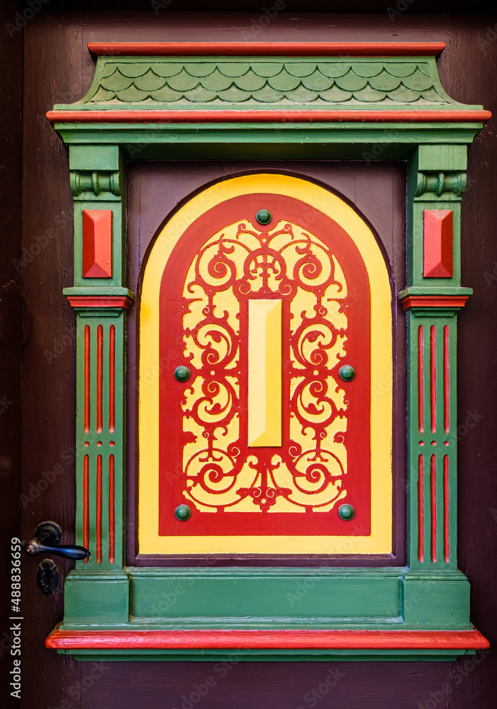 Sticker old wooden door at a historic building