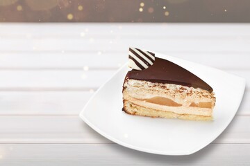 Honey cake slice on white plate