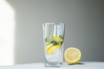 ice, mint and lemon in a glass